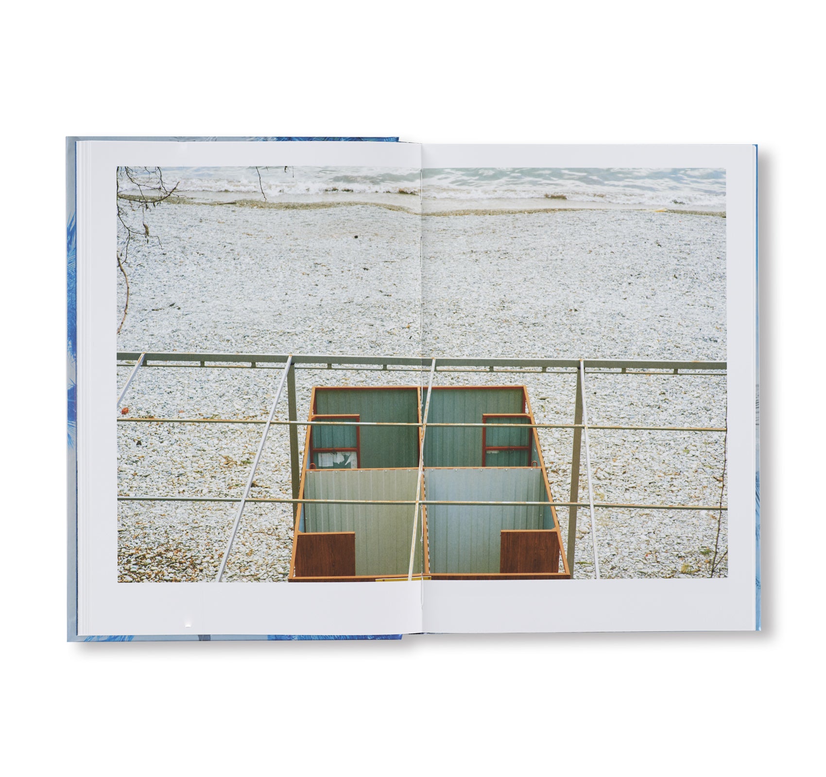 IN MOST TIDES AN ISLAND by Nicholas Muellner