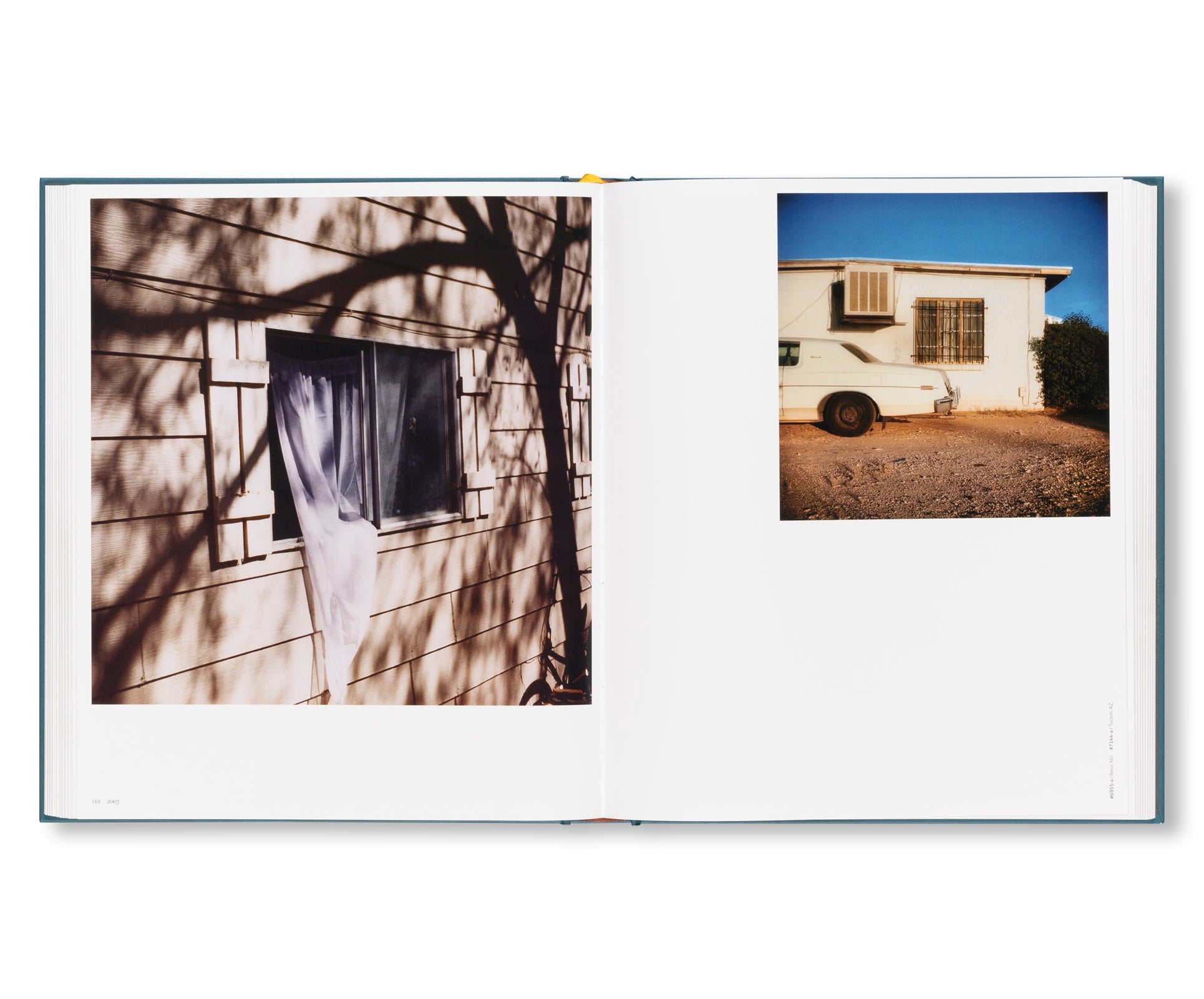 INTIMATE DISTANCE: OVER THIRTY YEARS OF PHOTOGRAPHS, A CHRONOLOGICAL ALBUM  by Todd Hido [REVISED AND EXPANDED EDITION]
